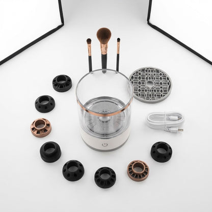 Electric makeup brush cleaner foaming while cleaning a brush on a dressing table